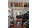 Spacious living room with a staircase and tiled floors at 1424 Sophie Way, Kissimmee, FL 34744