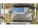 House with solar panels and a large backyard at 264 Citrus Pointe Dr, Haines City, FL 33844