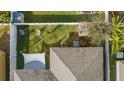 Small backyard with a shed and playset at 264 Citrus Pointe Dr, Haines City, FL 33844