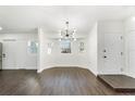 Bright dining room featuring modern lighting and large windows at 827 Albi Ct, Kissimmee, FL 34759