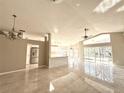 Bright living room with tile floors and high ceilings at 248 Lindale St, Lakeland, FL 33809