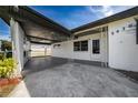 View of the side of the property and the front entrance at 5438 San Luis Dr, Orlando, FL 32807