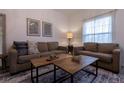 Inviting living room with stylish furniture, modern decor, and a cozy atmosphere at 8919 Shine Dr, Kissimmee, FL 34747