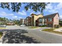 Apartment building showcasing multiple units and parking area at 2203 Key West Ct # 435, Kissimmee, FL 34741