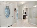 Interior entryway view, showing access to bathroom and other rooms at 6364 Domenico Ct, Groveland, FL 34736