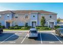 Charming condo exterior with tidy landscaping and convenient parking near the building entrance at 361 Annabelle Way, Davenport, FL 33837