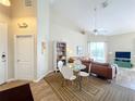 Inviting living room featuring a comfortable sofa, stylish decor, and a cozy atmosphere at 802 Brunello Dr, Davenport, FL 33897