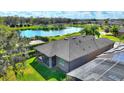 A screened in lanai and an expansive rear yard are overlooked by the rear of this house at 246 Tomelloso Way, Davenport, FL 33837