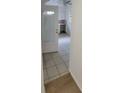 Mud room featuring tiled floors, a utility sink, and an exterior door at 332 Carolina Ave, St Cloud, FL 34769
