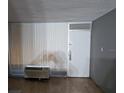 Room featuring a door with security features and window with blinds at 7900 S Orange Blossom Trl # 1039, Orlando, FL 32809