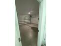 Spacious two-car garage with an automatic door opener at 915 Alsace Dr, Kissimmee, FL 34759