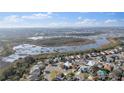 Expansive wetland view dotted with waterways and lush vegetation, showcasing nearby suburban homes at 1067 Ronlin St, Haines City, FL 33844