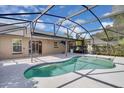 A refreshing screened-in pool with an attached patio, perfect for outdoor relaxation and entertainment at 4815 Doc Dr, St Cloud, FL 34771