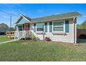 Attractive single-story home with a well-manicured lawn and inviting facade at 1422 Indiana Ave, St Cloud, FL 34769