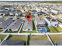 Aerial view of the property featuring a fenced backyard and community setting at 444 Lily Ln, Davenport, FL 33837