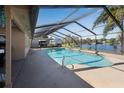 Screened-in pool with a beautiful lake view at 4500 Lake Trudy Dr, St Cloud, FL 34769