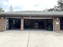 Spacious two-car garage with ample room for storage and projects at 3285 Majestic Oak Dr, St Cloud, FL 34771