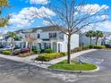 Community of townhomes with mature trees and sidewalks in a desirable location at 7682 Fitzclarence St, Kissimmee, FL 34747