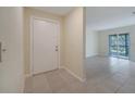 Inviting foyer with neutral colors, tile flooring, and easy access to living spaces at 2416 Swailes Dr # 8, Orlando, FL 32837