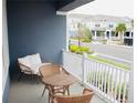 Cozy porch area with wicker furniture, creating a pleasant outdoor retreat at 452 Diamond Dove Cv, Winter Springs, FL 32708