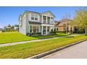 Beautiful two-story home with well-maintained lawn and sidewalk at 2800 Cello Ln, Kissimmee, FL 34741