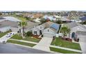 Lovely home with solar panels, manicured landscaping and a two car garage at 2559 Eagle Bay Blvd, Kissimmee, FL 34743