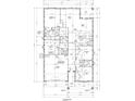 Blueprint of a home's floor plan, detailing room dimensions, layout, and features like kitchen, bedrooms, and garage at 1324 Kory St, Kissimmee, FL 34741