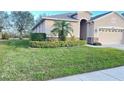 Beautiful single Gathering house with well kept garden and lovely lawn at 14112 Queenside St, Orlando, FL 32824