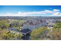 A shot showcasing the hotels roofline and entryway at 3000 Maingate Ln # 424, Kissimmee, FL 34747