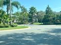 Beautiful community with lush landscaping, mature trees, and inviting green spaces at 14320 Desert Haven St # 3906, Windermere, FL 34786