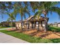 Beautiful single-story home with a two-car garage, manicured lawn, and a charming front porch at 2864 Lafayette Trace Dr, St Cloud, FL 34772