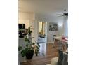 Open concept view of the dining area and patio at 2558 Robert Trent Jones Dr # 1412, Orlando, FL 32835