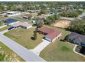 Spacious single-Gathering home with well-manicured lawn, fenced yard, long driveway, and a two-car garage at 15069 Sw 29Th Avenue Rd, Ocala, FL 34473