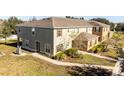 Wide exterior shot of the house with healthy lawn and walkway at 2851 Sunstone Dr # 2851, Kissimmee, FL 34758