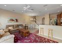 Open living room and dining area with lots of natural light and ceiling fan at 3971 Cesare St, Orlando, FL 32839