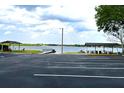 Waterfront community featuring picnic areas, a dock, and parking, perfect for outdoor enjoyment at 5019 Saint Germain Ave, Orlando, FL 32812