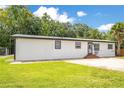Exterior view of the house highlighting the architecture, lawn, and design at 78 N 5Th St, Orlando, FL 32833
