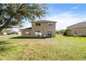 Expansive backyard with lush lawn, perfect for outdoor activities and entertaining at 4301 Presidio Way, Kissimmee, FL 34746
