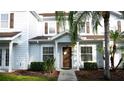 Charming two-story townhome with a well-maintained lawn, and a welcoming front entrance at 5364 Diplomat Ct # 106, Kissimmee, FL 34746