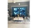 Inviting lobby area with stylish furniture, artwork, and a welcoming atmosphere for residents at 7740 Sandy Ridge Dr # 1, Kissimmee, FL 34744