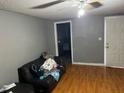 Open living area with hardwood floors and natural light at 10538 Clarcona Ocoee Rd, Apopka, FL 32703