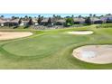 Scenic golf course view featuring lush green grass, sand traps, and manicured landscaping at 1335 Palmetto Dunes St, Davenport, FL 33836