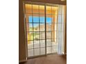 Covered patio view with sliding glass doors at 619 Terrace Ridge Cir # 619, Davenport, FL 33896