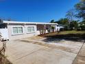 Charming single-story home with a well-manicured lawn and freshly painted exterior at 1937 Barksdale Dr, Orlando, FL 32822