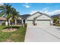 Charming single-story home featuring a well-manicured lawn and a two-car garage at 784 Seneca Trl, St Cloud, FL 34772