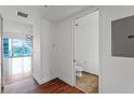 Hallway view of half bath with neutral tile and modern fixtures at 150 E Robinson St # 219, Orlando, FL 32801