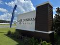 Entrance sign for Lake Denham Estates, a modern residential community at 30376 Armenia Rd, Leesburg, FL 34748