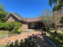 Inviting brick walkway leading to the front entrance of this charming home at 3725 Blossom St, Kissimmee, FL 34746