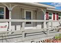 Cozy front porch with comfortable seating and charming details, enhancing curb appeal at 1622 Marlin St, St Cloud, FL 34771