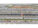 Aerial view of the townhome and its place within the community, including parking and amenities at 4002 Lana Ave, Davenport, FL 33897